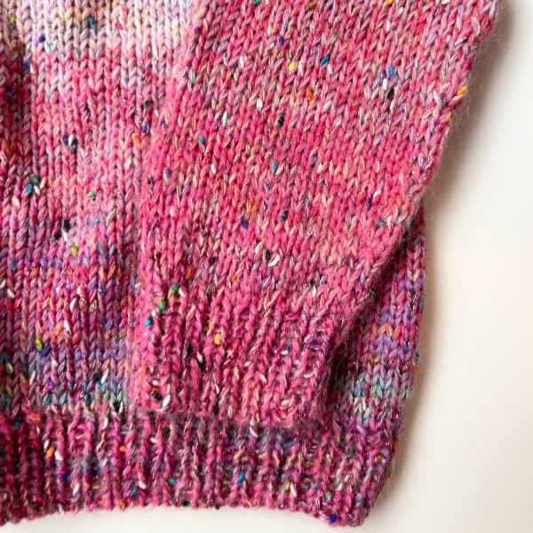 The hem of a leftover sweater